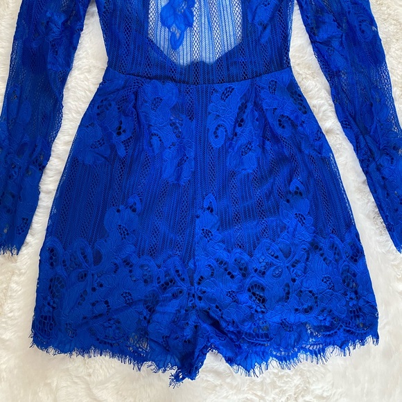 Charlotte Russe - Cobalt Blue Floral Lace Long Sleeve Open Back Bodycon Romper - Picture 9 of 10